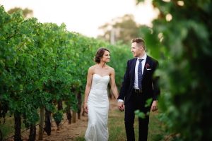 bride-and-groom-in-the-vines
